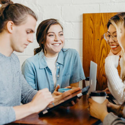 students working together in coffee shop